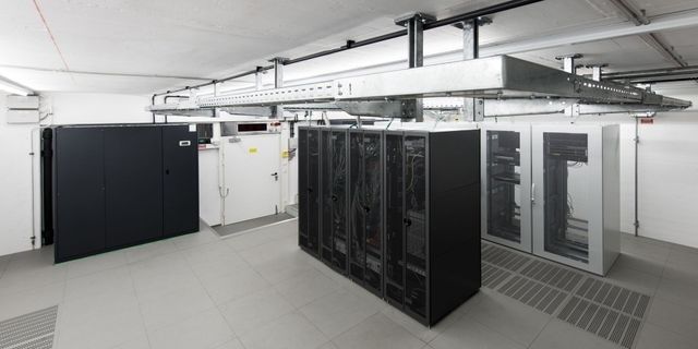 Server racks and overhead cooling infrastructure in a data center